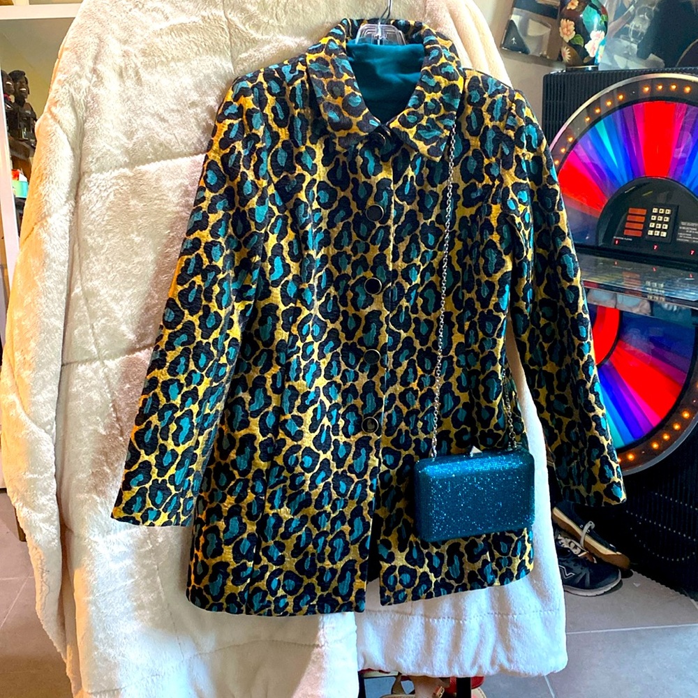 Leopard,turquoise with a gold background. A long topper jacket/ boyfriend style.